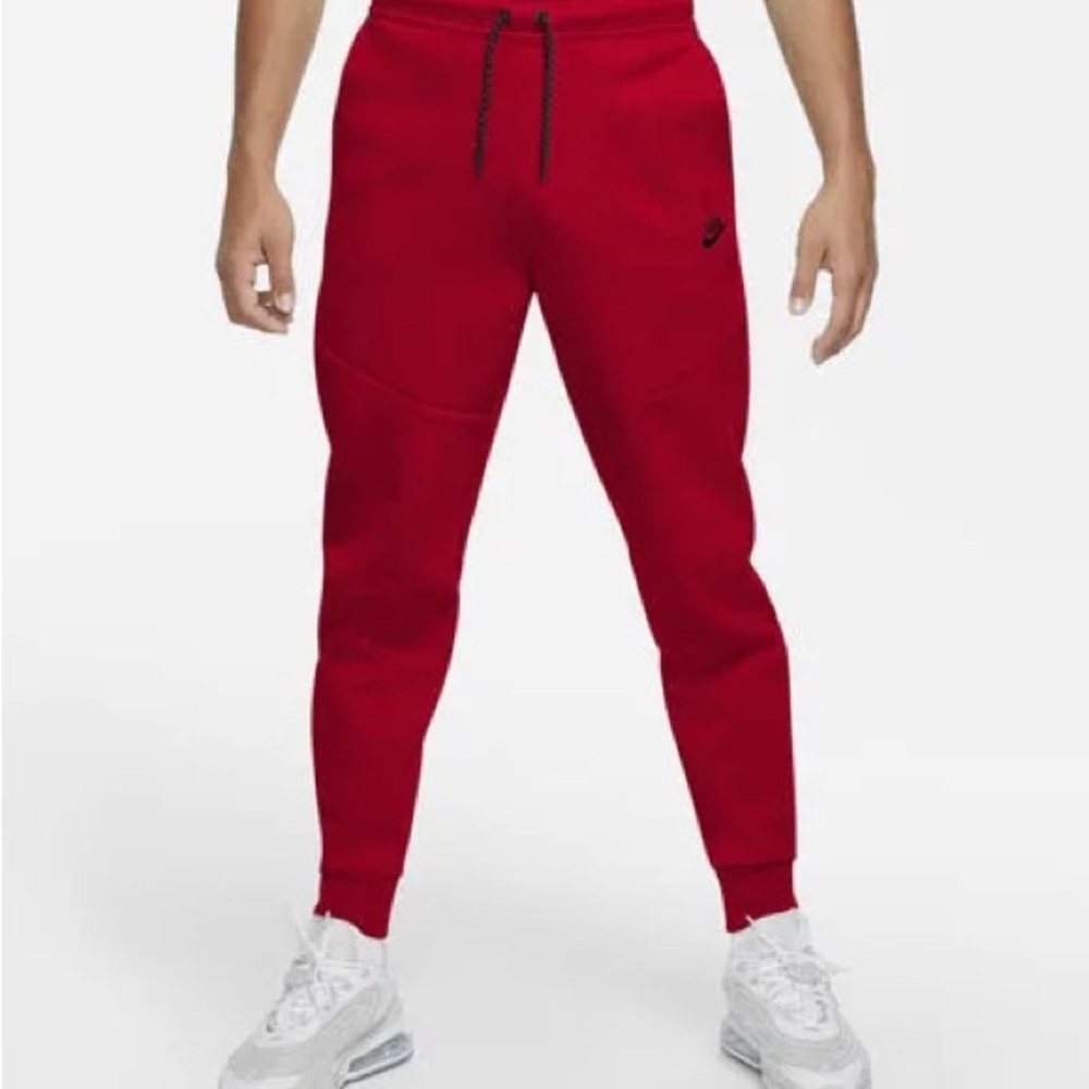 Red Nike tech pants (must go)